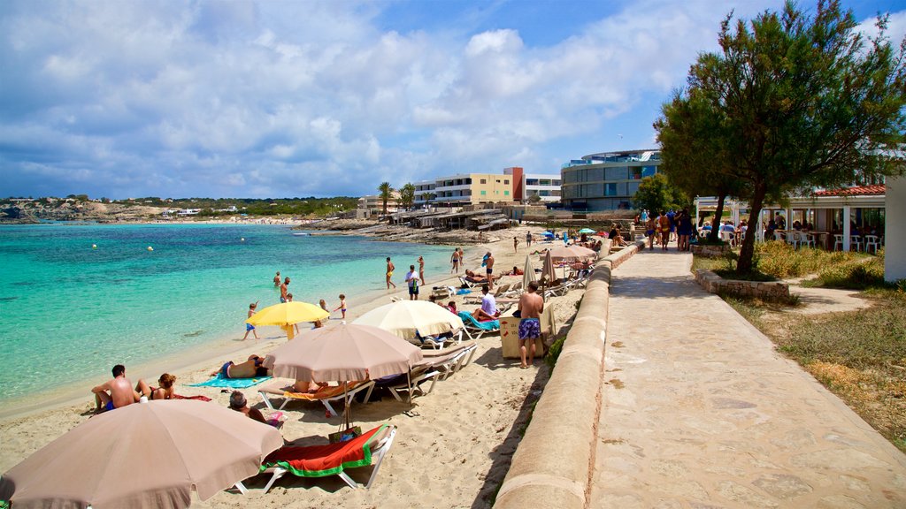 Es Pujols Beach which includes general coastal views, a coastal town and a sandy beach