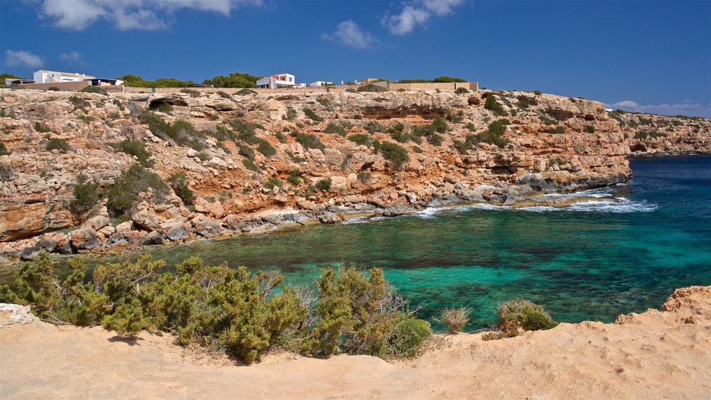 Cala en Baster showing rugged coastline and general coastal views