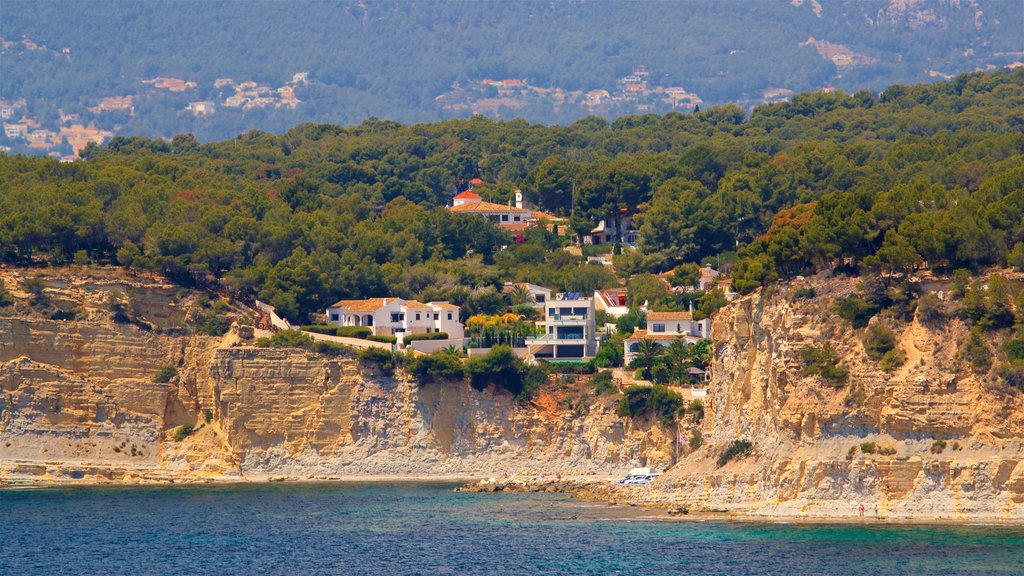 Benissa Coast showing rocky coastline, a coastal town and general coastal views