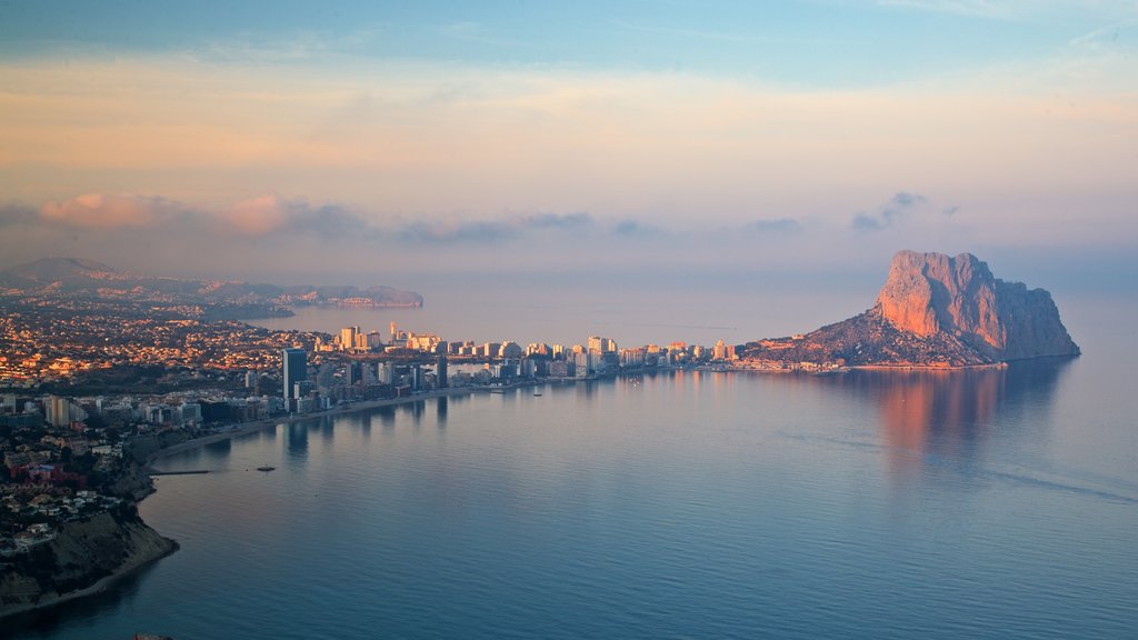 Mirador Monte Toix showing mist or fog, a coastal town and landscape views