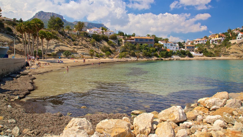 Plage Puerto Blanco mettant en vedette paysages côtiers et une ville côtière