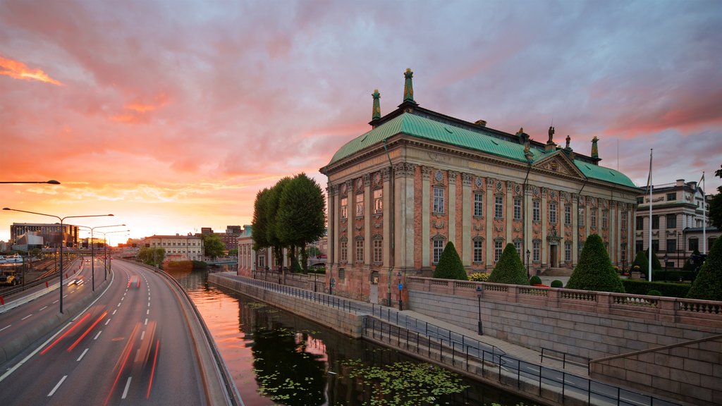 Riddarholmen showing a sunset, heritage architecture and a city