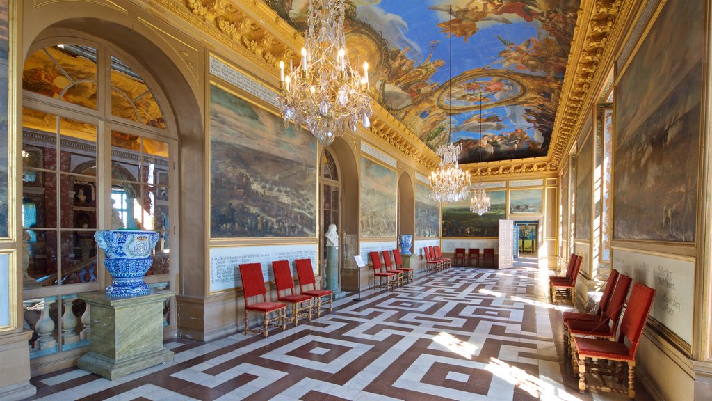 Drottningholm Palace featuring art, interior views and heritage elements