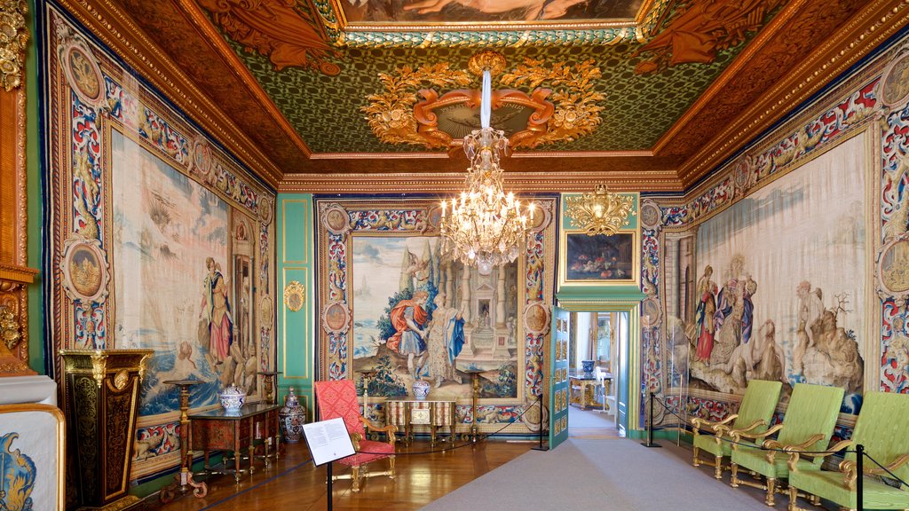 Drottningholm Palace which includes heritage elements, a castle and interior views