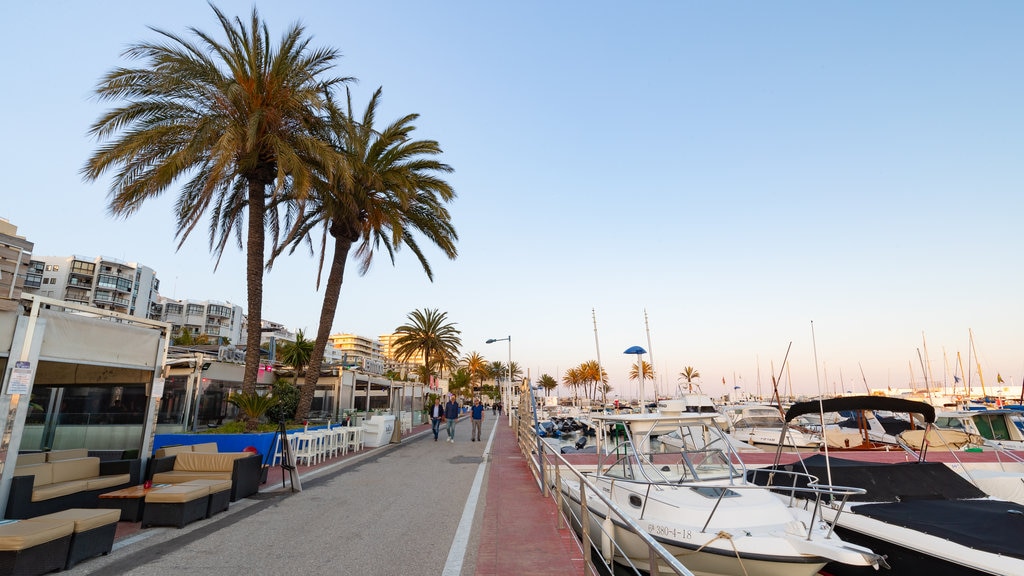 Marbella Marina which includes a bay or harbor and a coastal town