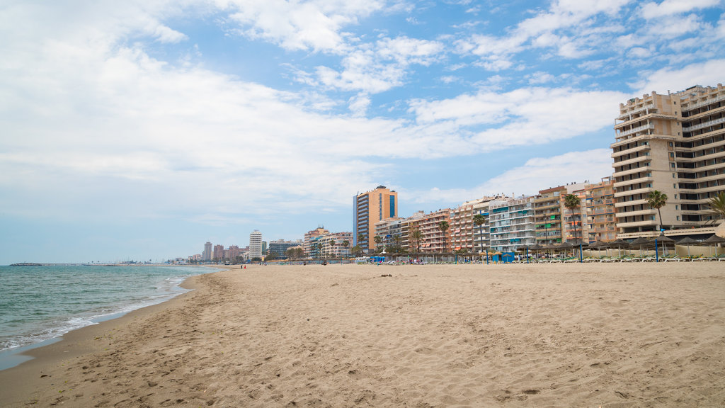 Las Gaviotas Beach showing a coastal town, general coastal views and a beach