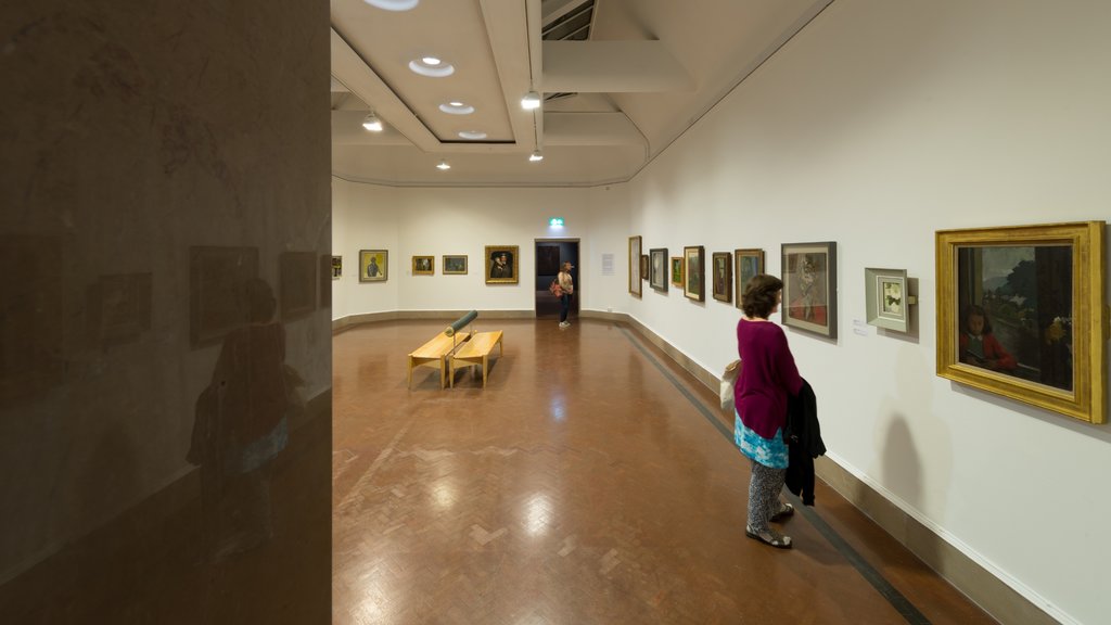 Southampton City Art Gallery showing interior views and art as well as an individual female