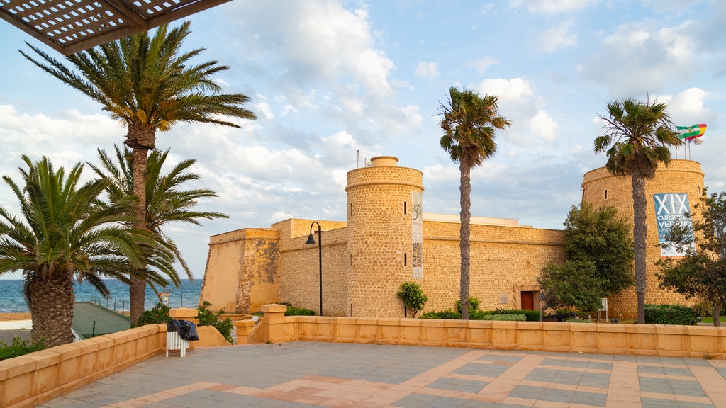 Roquetas de Mar showing heritage elements and a coastal town