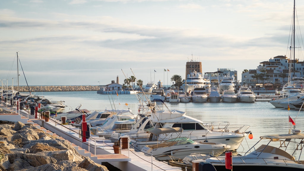 Puerto Banus Marina showing a sunset and a bay or harbor