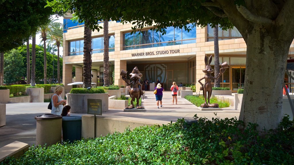 Warner Brothers Studio which includes a statue or sculpture, a park and outdoor art