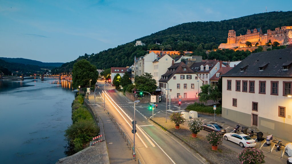 Altstadt which includes a small town or village and a river or creek