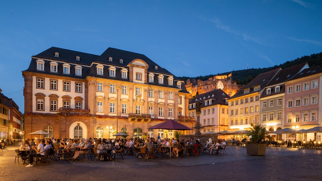 Altstadt showing night scenes, outdoor eating and a city