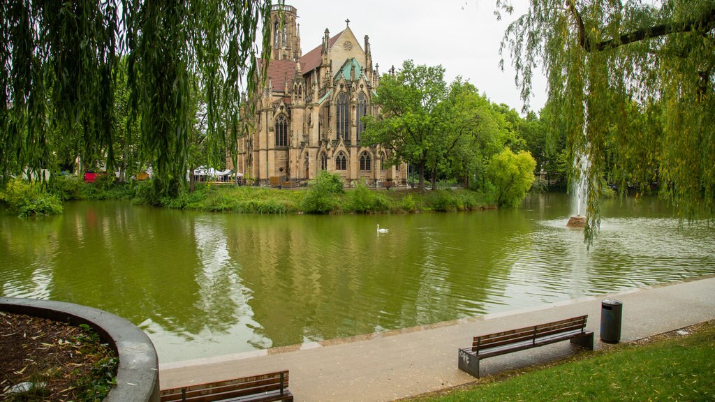 Germany featuring a church or cathedral, a pond and heritage architecture