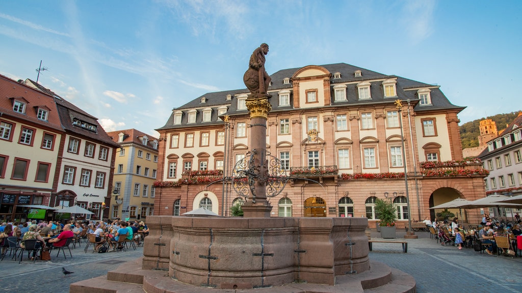 Hercules Fountain showing a city, outdoor eating and a fountain