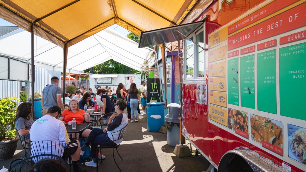 Portland showing outdoor eating as well as a small group of people