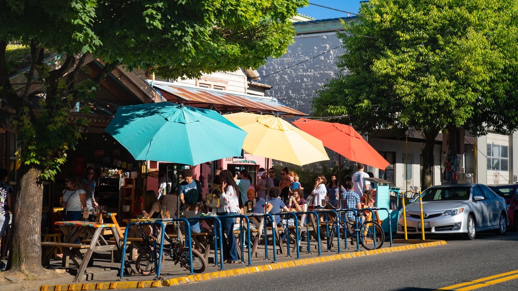 Portland showing outdoor eating as well as a small group of people