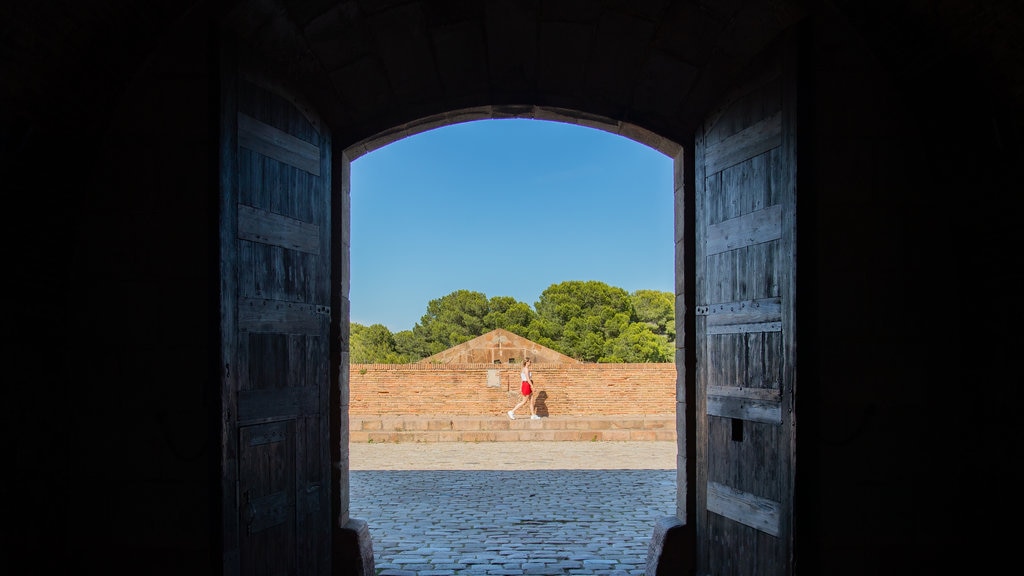 Montjuic Castle which includes interior views and heritage elements