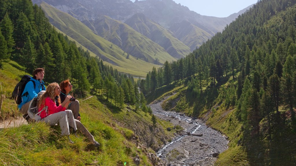 St. Moritz featuring hiking or walking, tranquil scenes and a sunset