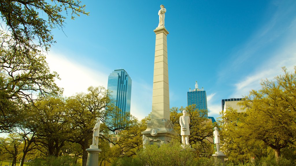 Dallas showing skyline, a monument and a park