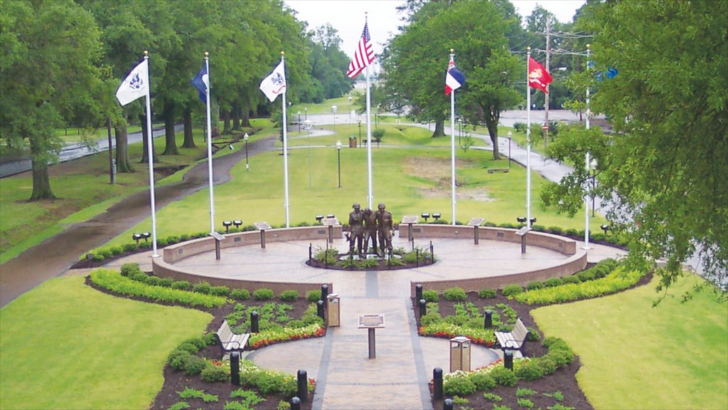 Tunica which includes a garden, a memorial and a statue or sculpture