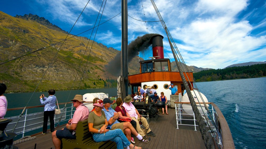 TSS Earnslaw Steamship showing boating and general coastal views as well as a large group of people