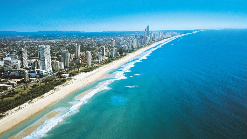 Broadbeach showing a beach, a city and central business district