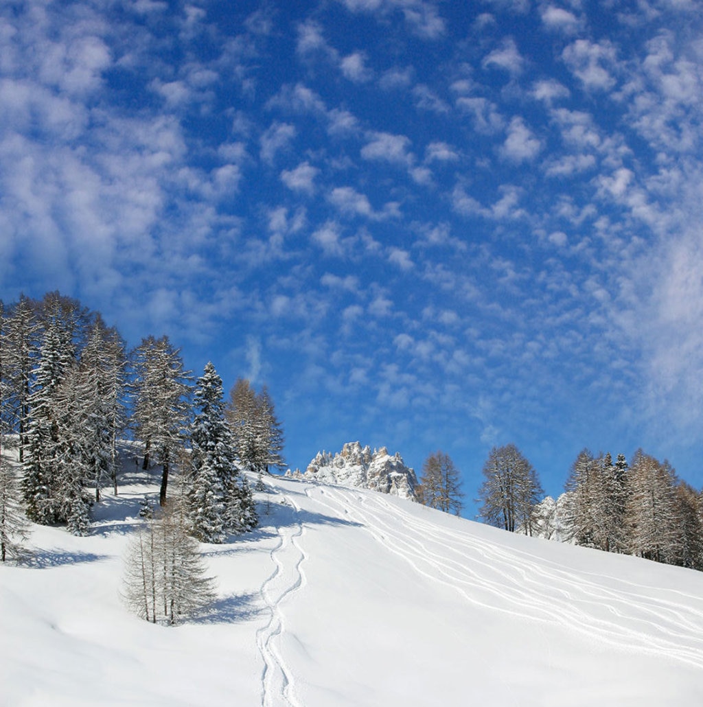 Nuvole e neve sotto la Croda Rossa, Sesto, Alta Pusteria. Photo credit Shutterstock