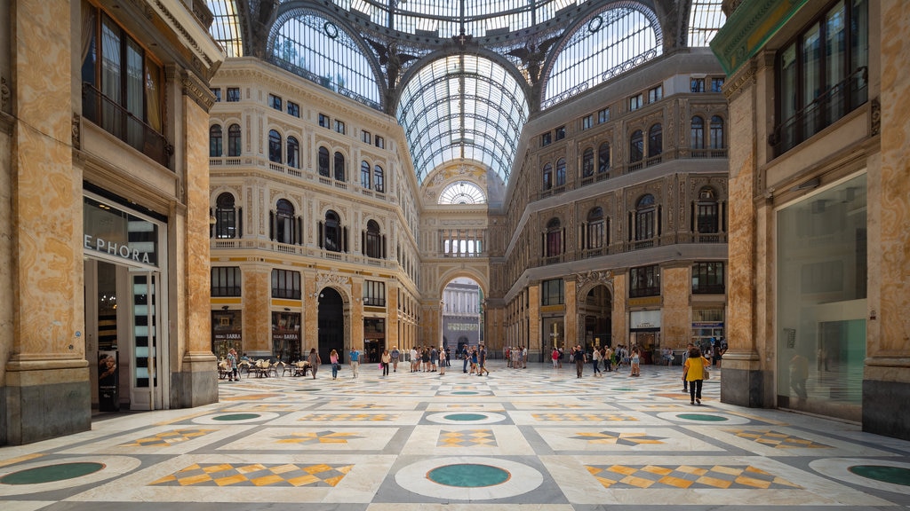 Galleria Umberto which includes interior views, a square or plaza and heritage elements