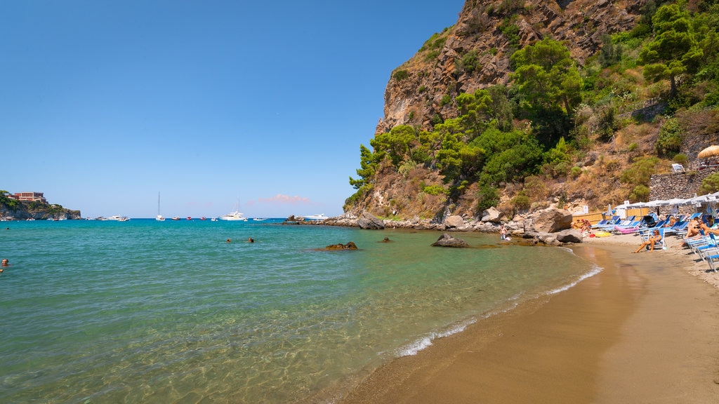 Bay of San Montano showing rocky coastline, a beach and general coastal views