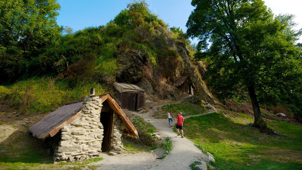 Arrowtown featuring a park and hiking or walking as well as a couple