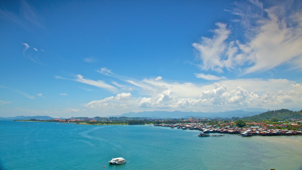 Kota Kinabalu showing a bay or harbour, a coastal town and boating