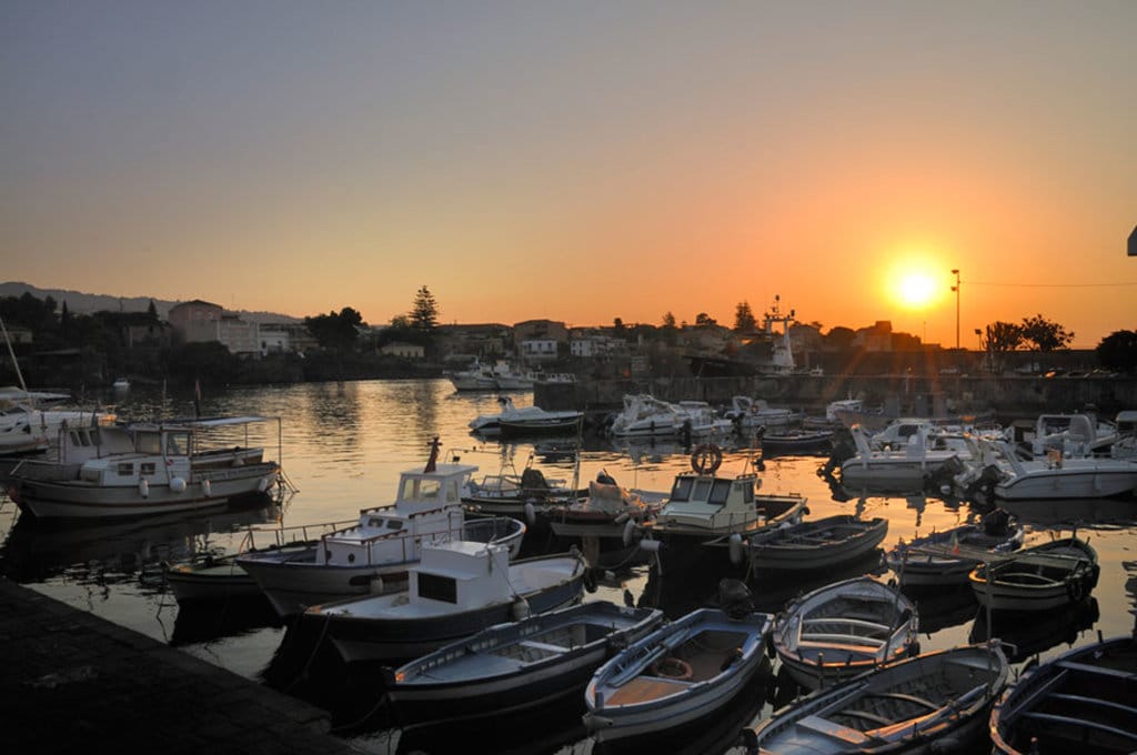 Porto di Ognina al tramonto. By gnuckx  , via Flickr