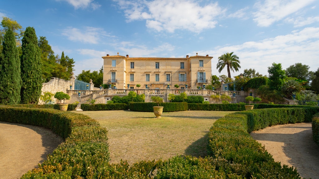 Chateau de Flaugergues featuring a garden and heritage architecture