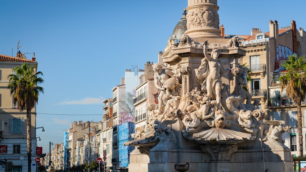 La Castellane which includes heritage elements, a statue or sculpture and a fountain