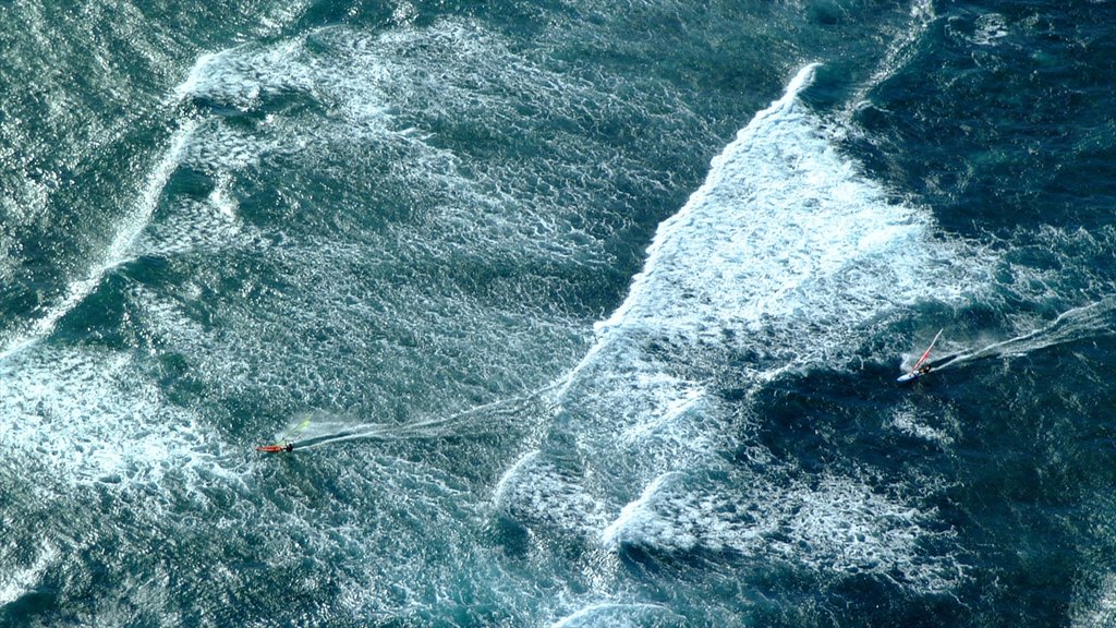 Kapalua Beach showing waves, water sports and windsurfing