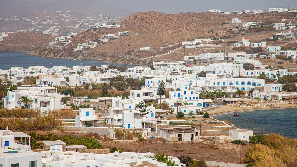 Ornos Bay which includes tropical scenes, a coastal town and general coastal views