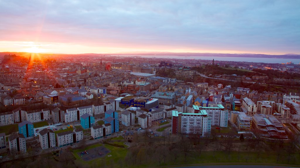 Arthur\'s Seat showing a sunset and a city