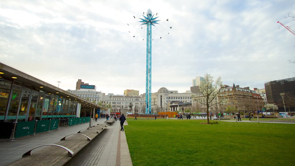 Piccadilly Gardens showing a city and a park