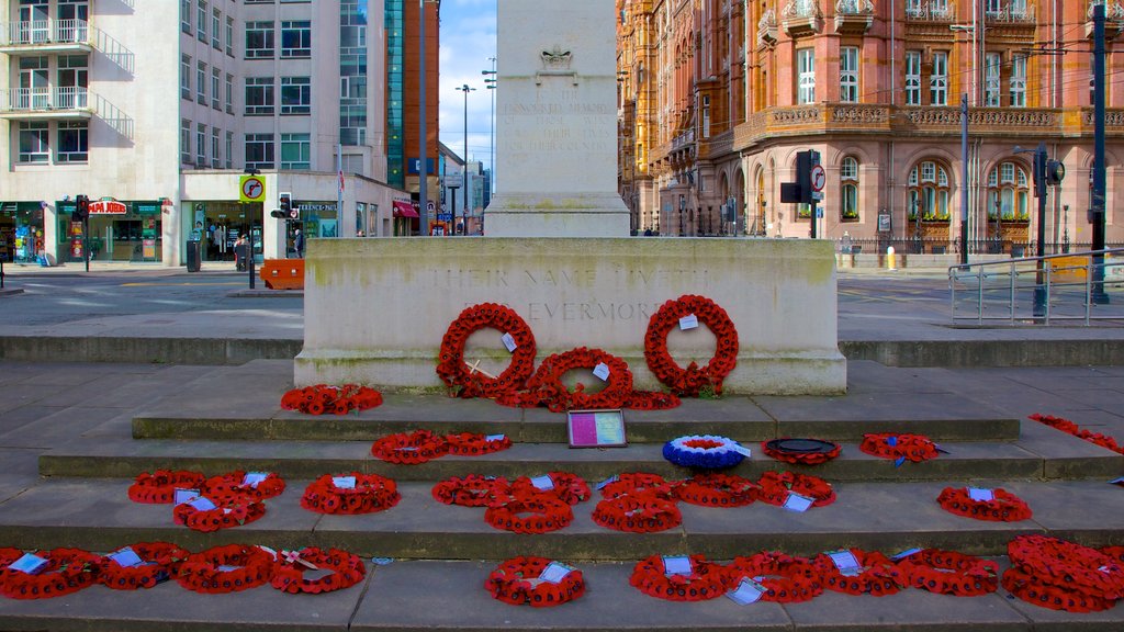 St. Peter\'s Square featuring a city, flowers and a memorial