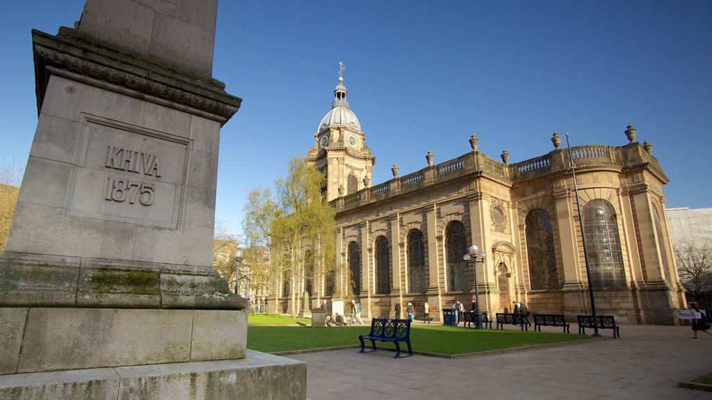 Birmingham Cathedral showing heritage architecture, signage and a city