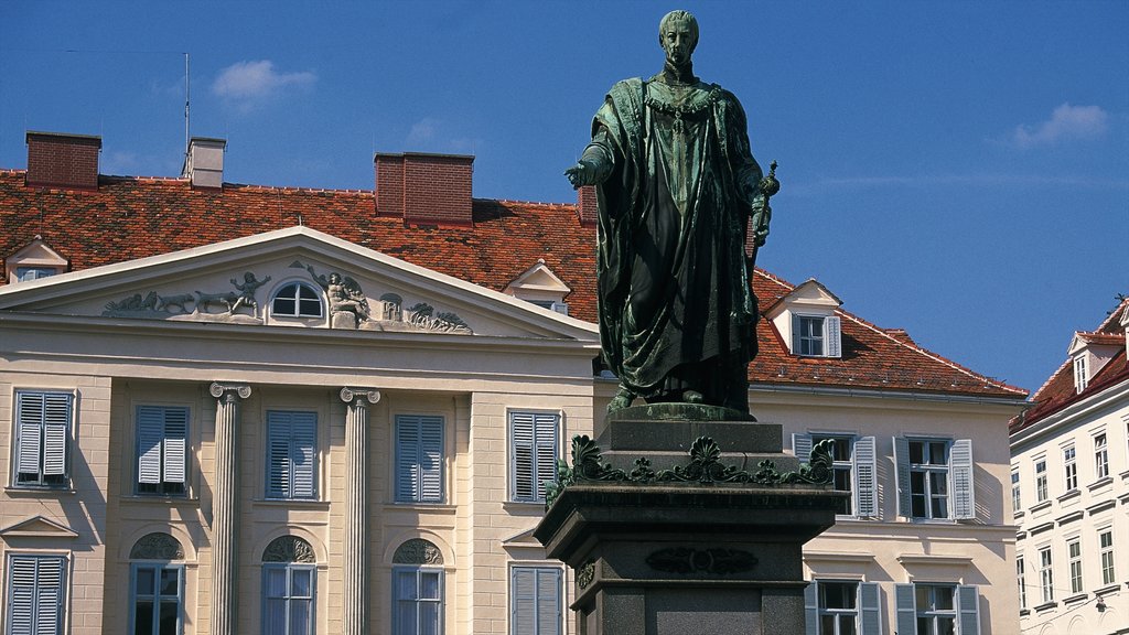 Graz featuring a statue or sculpture, heritage architecture and outdoor art