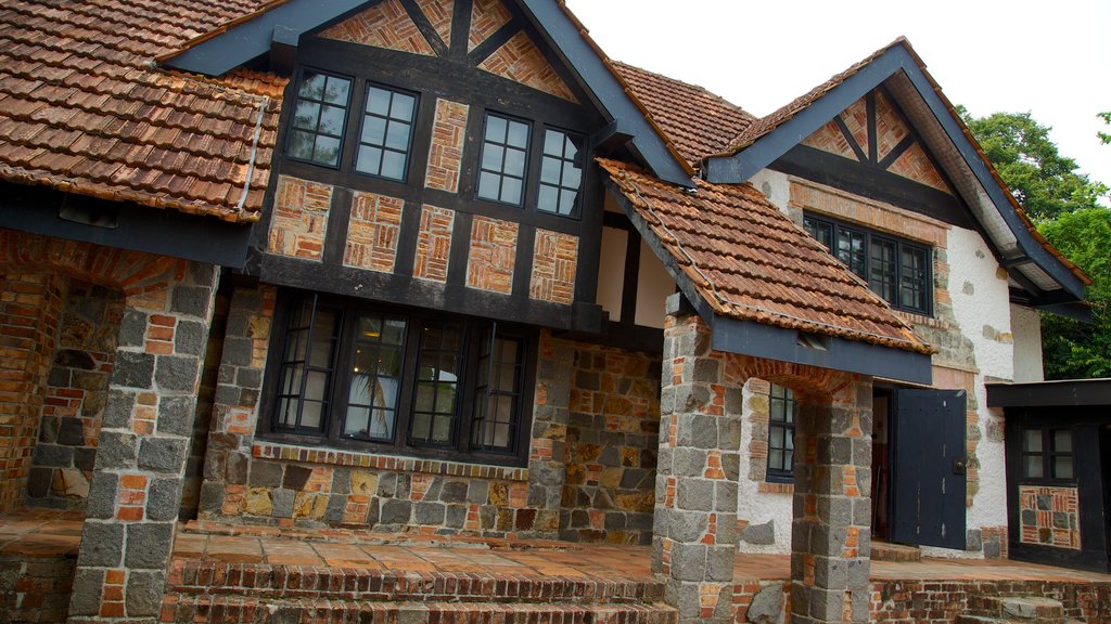 Pulau Ubin showing heritage architecture, a house and a city