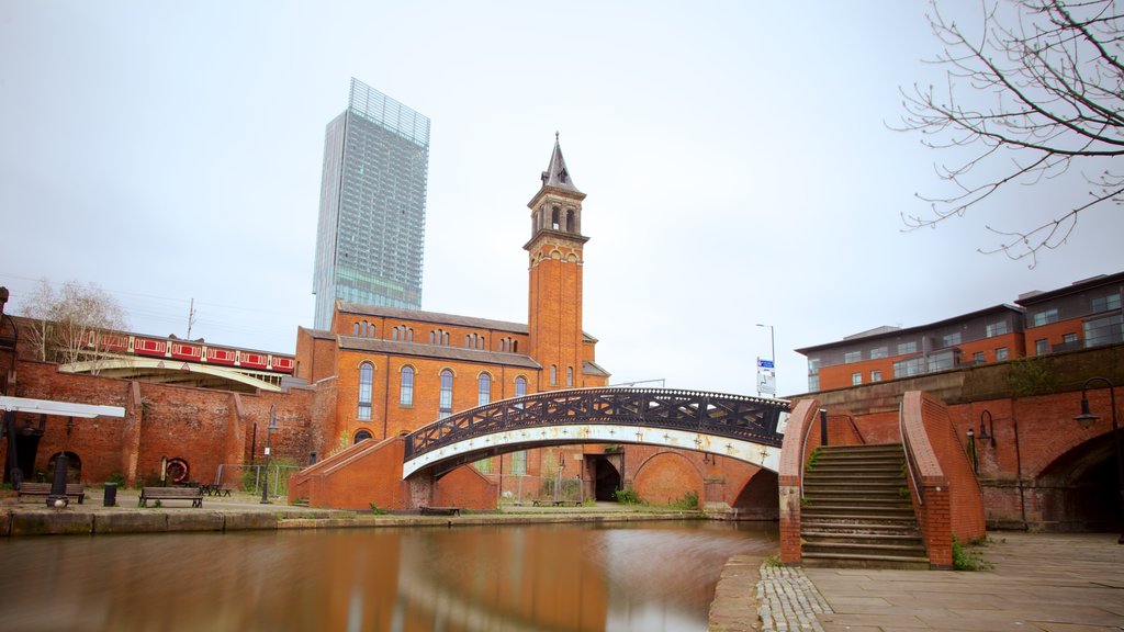 Castlefield Roman Fort featuring a river or creek, heritage architecture and a bridge