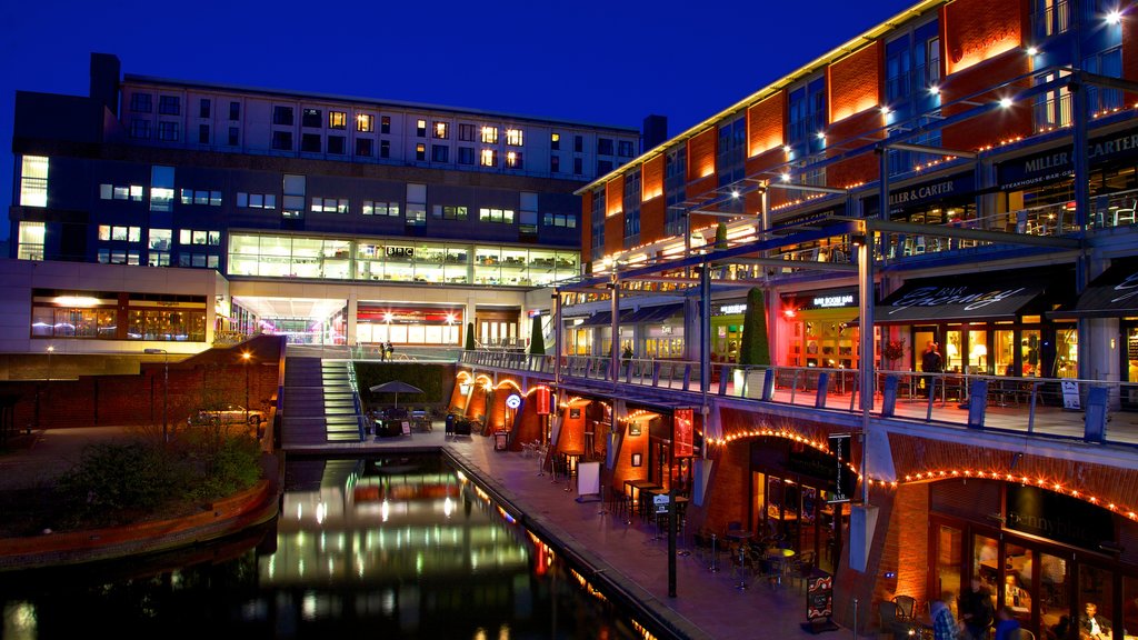 The Mailbox showing night scenes, city views and a city