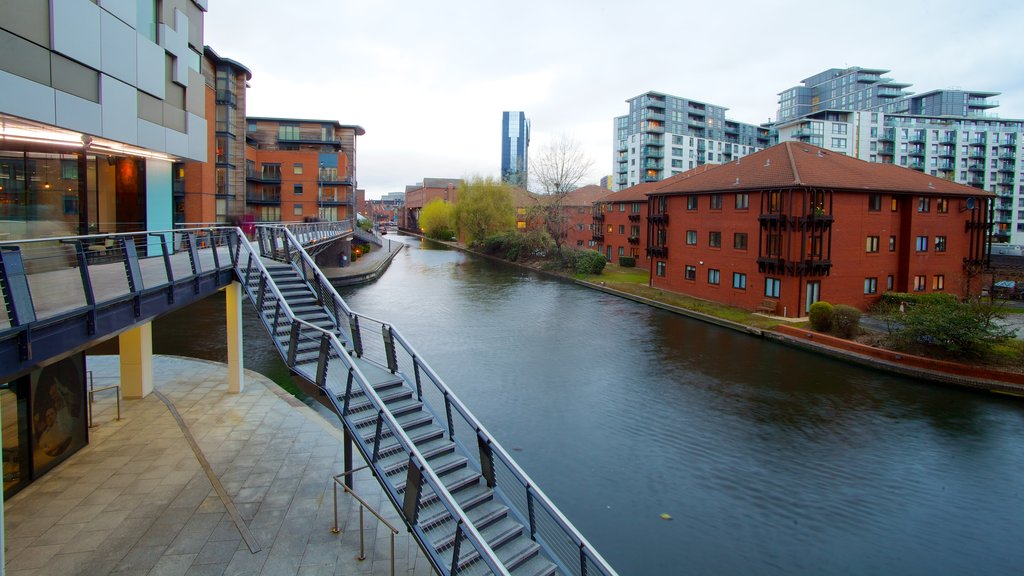 The Mailbox showing a river or creek and a city