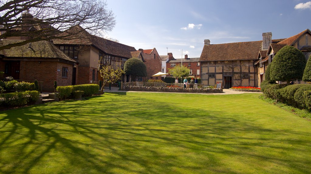 Birmingham showing a garden, a house and a small town or village