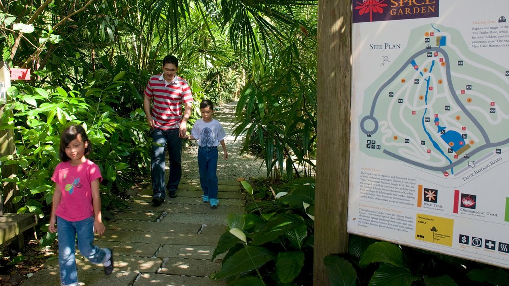 Jardin d\'épices tropical montrant parc et scènes tropicales aussi bien que famille