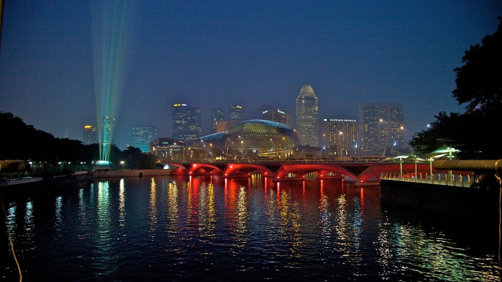 Boat Quay showing a city, a river or creek and night scenes