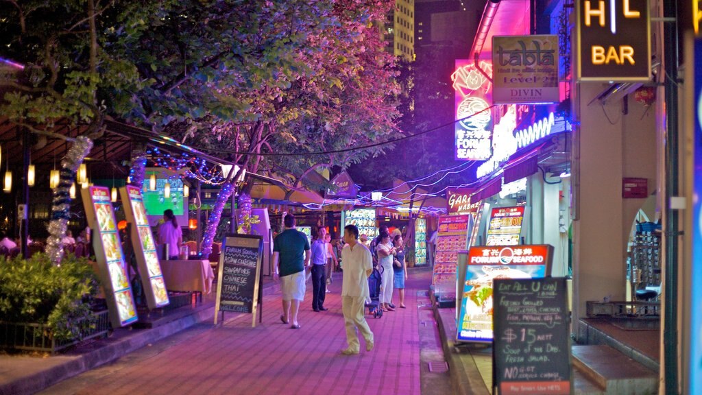 Boat Quay which includes a city, street scenes and night scenes