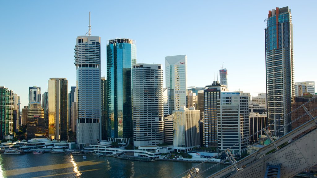 Story Bridge showing central business district, a high-rise building and a bay or harbour